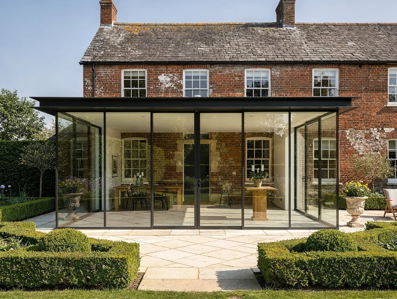 Harpenden Construction specialist residential building disciplines - structural glass extension overlooking courtyard